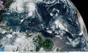 East Coast buffeted by Humberto, Imelda