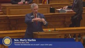 Bill reducing income tax sparks heated debate before passage